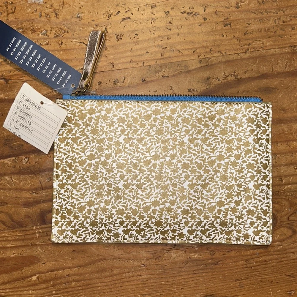 ANTHROPOLOGIE TAURUS NWTs Cute, patterned, wristlet zodiac leather zip top boho